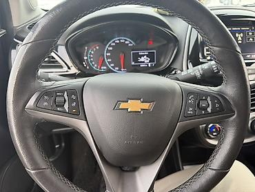 Другие детали салона: Chevrolet (интерьер, мультимедиа и оснащение) - Руль с кожаной — 1