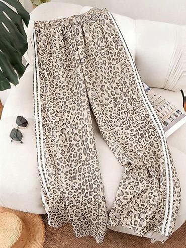 Pantalone: Ženske široke pantalone sa leopard printom - Kroj: široke nogavice — 2