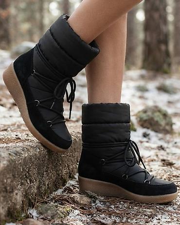 ugg bor: Ženske zimske čizme u crnoj boji, dizajnirane za udobnost i toplinu — 1