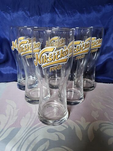 Čaše: Case nove Niksicko pivo. Nove case. sve na njima odsjaj od svetla na lalafo.rs — 5 Čaše: Case nove Niksicko pivo. Nove case. sve na njima odsjaj od svetla — 5