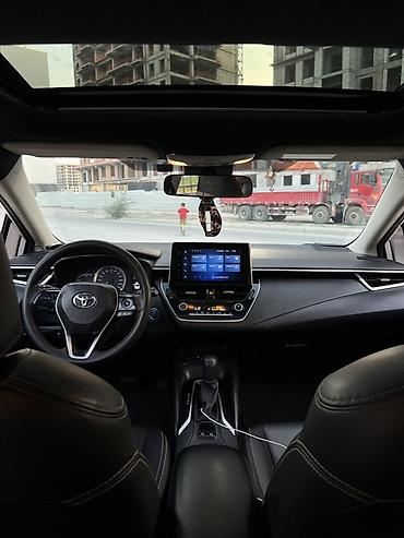 byd e2: Toyota Corolla: 2021 г., 1.8 л, Вариатор, Гибрид, Седан — 8