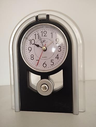 ev saatı: Saat hü 15 sm en 12 sm budilnikidə vat — 2