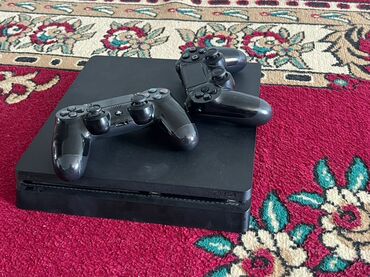 купить умные детские часы в бишкеке: Игровая консоль Sony PlayStation 4 черного цвета, модель Slim