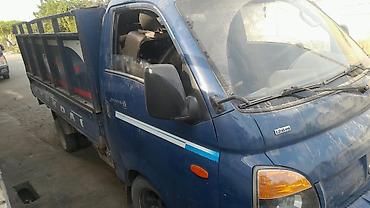 ковш на кун: Hyundai Porter (голубой), малотоннажный бортовой грузовик — 3