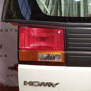 vg33: Фонарь заднего хода NISSAN ELGRAND ALE50 VG33E 1998 лев. (б/у) — 1