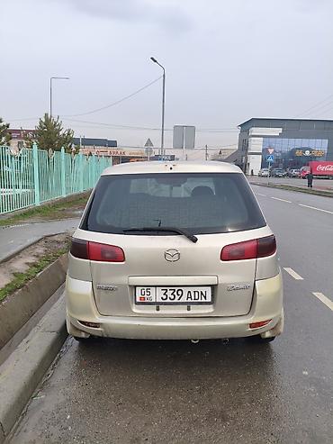 range over: Mazda Demio: 2003 г., 1.5 л, Автомат, Бензин, Хэтчбэк — 2