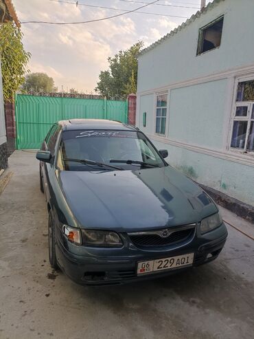 мазда 6 атенза: Mazda 626 седан (GF), темно‑зеленый цвет кузова. Основные