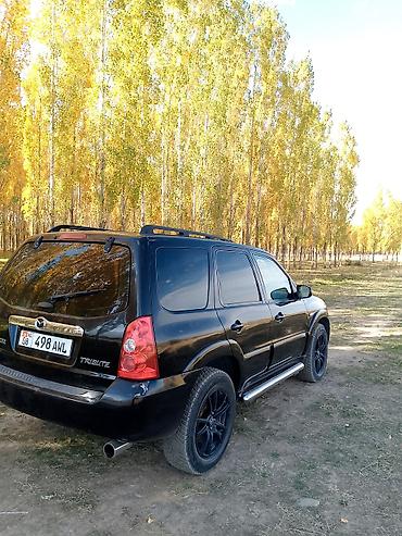 mazda 323 1999: Mazda Tribute: 2004 г., 2.3 л, Механика, Бензин, Кроссовер — 4