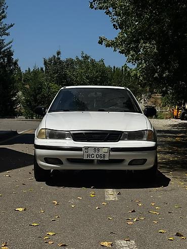 opel astra g opc: Ağ rəngli sedan, 4 qapılı, ön ötürücülü. Klassik, sadə dizaynlı kuzov — 3