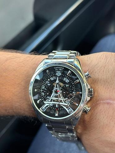 Yenidi.!!! Qutuda. Cox agir gewey saatdi. Bahali saatdi. TAG Heuer