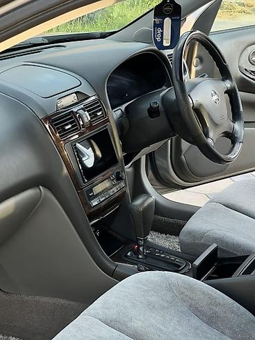 карплей: Nissan Cefiro: 2001 г., 2 л, Автомат, Бензин, Седан — 7