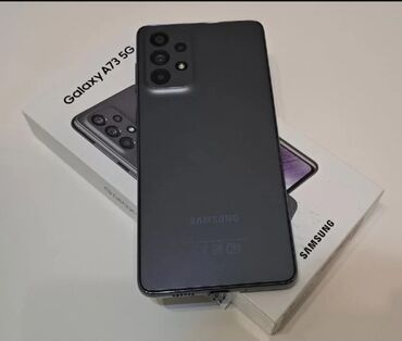Samsung: Samsung Galaxy A73 5G, 128 GB, rəng - Boz, Sensor, Barmaq izi, İki sim kartlı
