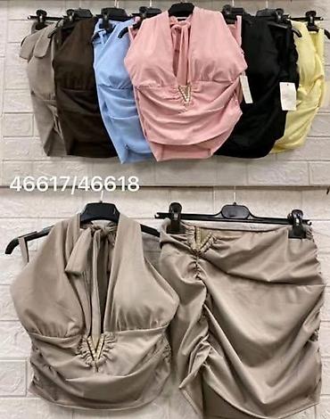 aksa: Suknjica i crop top majica komplet.Majica se vezuje oko vrata sa — 6