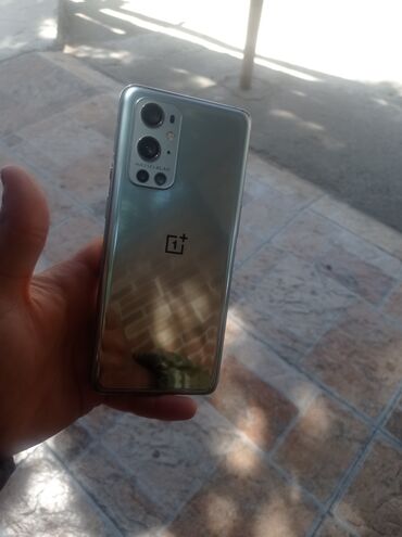 телефон fly b400: OnePlus 9 Pro, 128 ГБ, цвет - Зеленый, Сенсорный, Отпечаток пальца, Две SIM карты