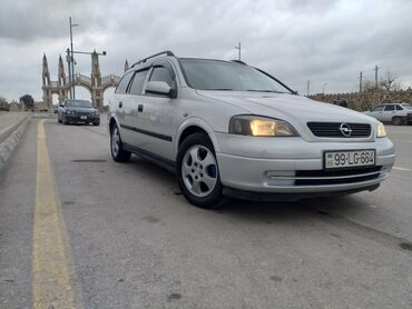 bankda olan masinlar odenissiz ancaq ayliq: Opel Astra: 1.8 l | 1999 il | 495600 km Universal
