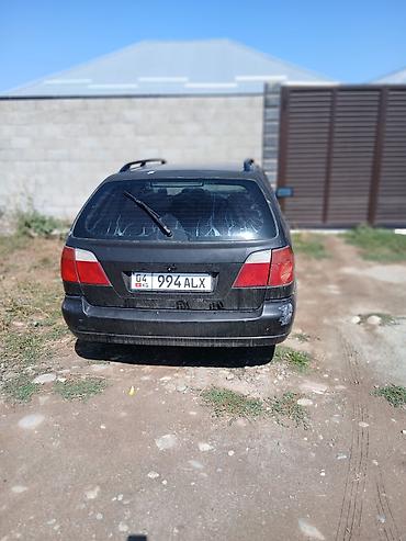 кышкы: Nissan Primera: 2001 г., 1.8 л, Кол менен иштөөчү, Бензин, Универсал — 2