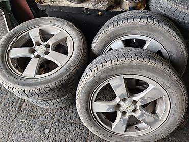 265 65 17 type 0: Salam 16 lik disk teker 5 bolt 215.55.16. Diskde cat udar svarka yoxdu — 1