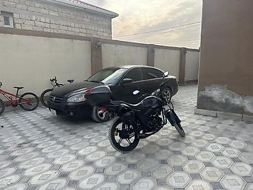 moped gunluk: Şəhər içi və qısa məsafələr üçün praktik motosiklet. Xüsusiyyətlər: - — 2