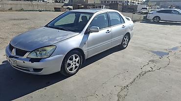 duman fara: Mitsubishi Lancer: 1.6 l | 2006 il 466000 km Sedan — 7
