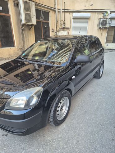 Kia: Kia Rio: 1.4 l | 2009 il Sedan — 18