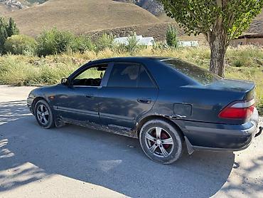 385 55: Mazda 626: 1997 г., 1.8 л, Механика, Газ, Седан — 4