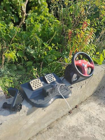 Genius sükan və pedal dəsti – kompüter və konsol oyunları üçün yarış