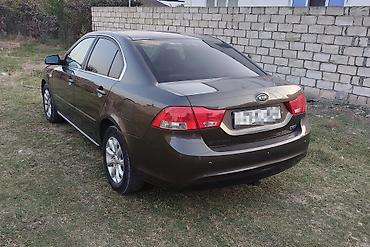 horizon təkər: Kia Optima: 2 l | 2009 il Sedan — 2