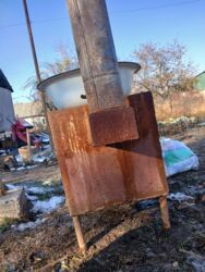газовая печь для отопления частного дома: Печь-буржуйка на твердом топливе - Материал: стальной сварной корпус
