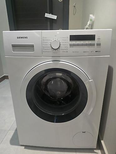 simens: Siemens önyükləməli paltaryuyan maşın - Model xətti: iQ300 — 1