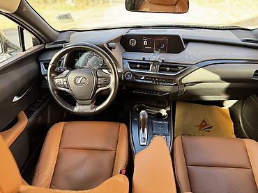 w210 дверные карты: Lexus UX: 2022 г., Вариатор, Электромобиль, Кроссовер — 7