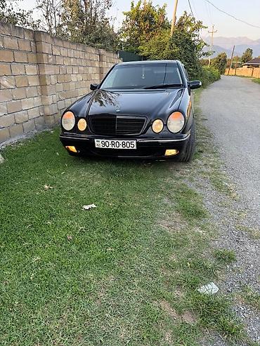 w210 duman: Mercedes-Benz E-Class (W210) sedan, qara rəng. Xüsusiyyətlər və — 5