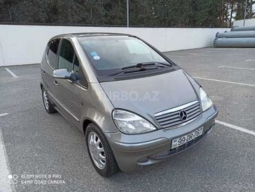 фольксваген поло хэтчбек: Mercedes-Benz A-Class A160, boz rəng, hetçbek kuzov. Xüsusiyyətlər: -