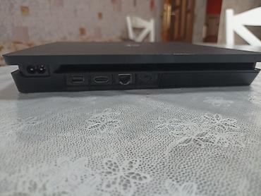 PS4 (Sony Playstation 4): Sony PlayStation 4 Slim oyun konsolu Xüsusiyyətlər: - Model: PS4 — 5