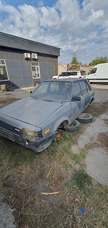 323 автомат: Mazda 323: 1983 г., 1.3 л, Механика, Бензин, Хэтчбэк — 8