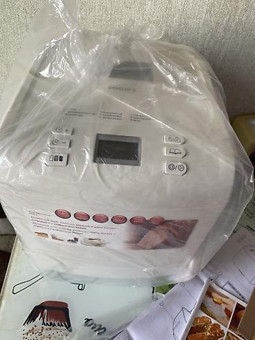 haley food chopper: Philips Daily Collection çörəkbişirən aparat. Ağ rəngli, kompakt — 1