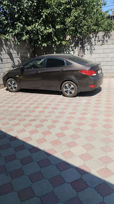 саларис 2013: Hyundai Solaris: 2015 г., 1.6 л, Автомат, Седан — 1