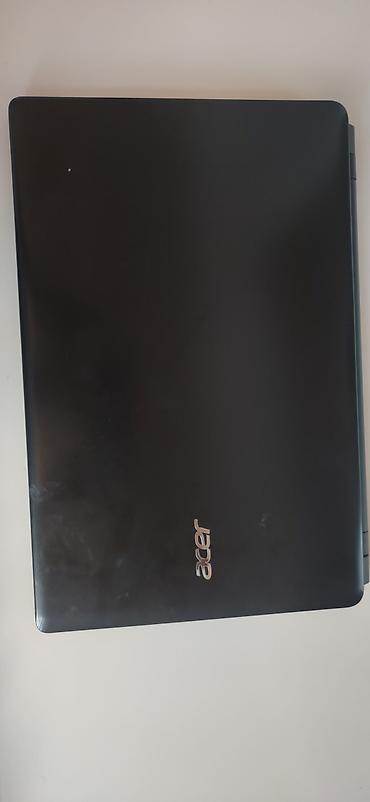 Acer Aspire E1-510 noutbuk Üzərində: •Mouse •Adapter •Çanta verilir 1