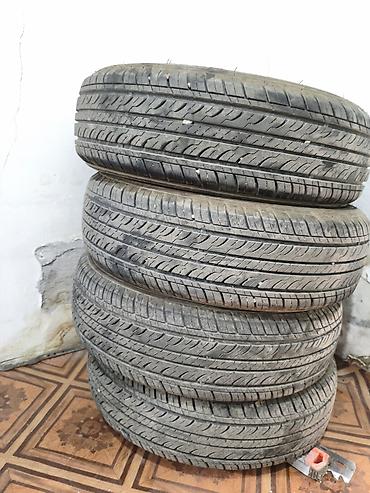 13 диски: Комплект автомобильных шин 165/70 R13 79T M+S. - Размер: 165/70 R13 - — 2