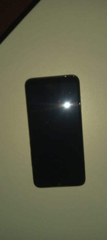 телефоны флай фс: Xiaomi Redmi Note 7, 32 ГБ, цвет - Черный, 
 Отпечаток пальца, Face ID