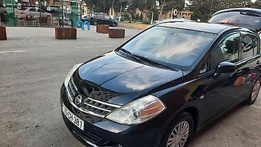 Nissan: Nissan Tiida: 1.5 l | 2011 il Hetçbek — 4