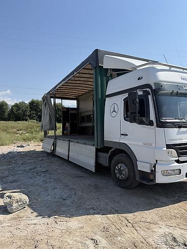 авто шпаклёвка: Грузовой Mercedes-Benz Atego тентованный (шторный фургон). 19.5 ‘ — 7