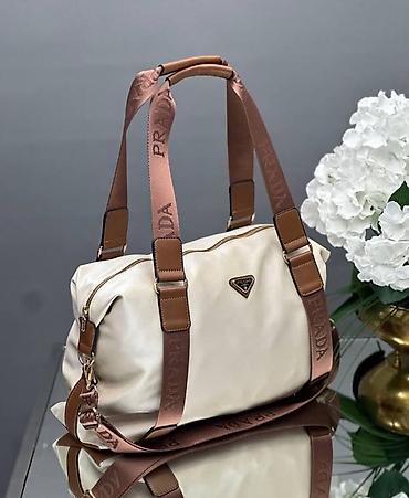 Torba – bež ručna/ramena, sportsko‑elegantnog dizajna - Materijal