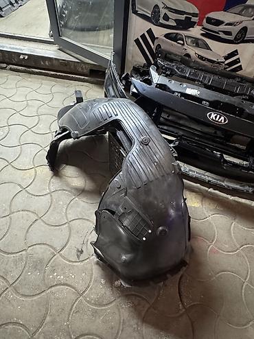 Подкрылок (локер) переднего колеса для Kia. Оригинальная пластиковая