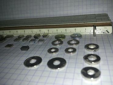 Другие аксессуары для салона: Неодимовые магниты. Разного размера и формы. Образцы на фото, линейка — 17