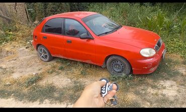 кредит на машину: Красный хэтчбек Daewoo Lanos . 100 миң, кеми бар. обмен да каралат