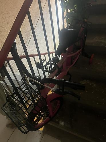Velosipedlər: Uşaq velosipedi – qızlar üçün, çəhrayı rəngdə Xüsusiyyətlər: - Ölçü — 2