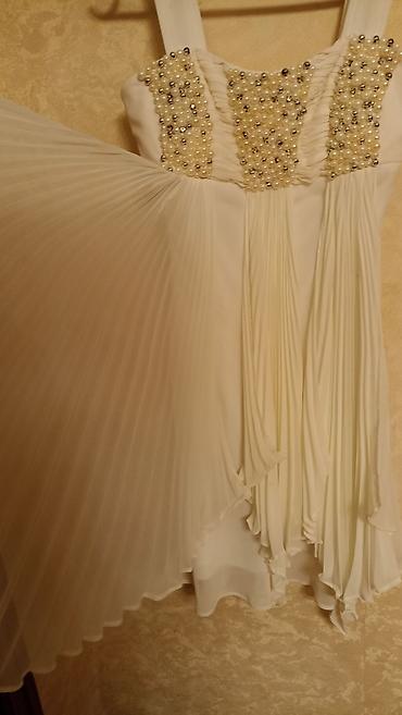 Ziyafət donları: Ağ don,2dəfə geyinilib.200azn alınıb — 7