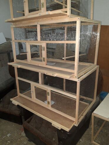 Qəfəslər: Taxta quş qəfəsi – ikixanalı model Xüsusiyyətlər: - Material: təbii — 12