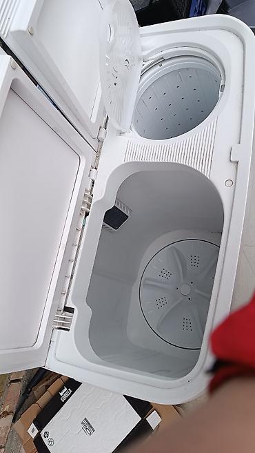 Бытовая техника: Стиральная машина Artel TG70 (полуавтомат, активаторная) - Загрузка — 3