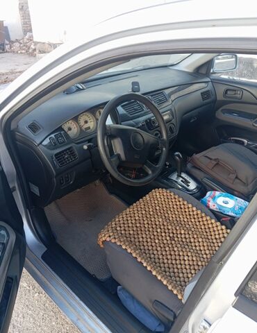 Mitsubishi: Mitsubishi Lancer: 2004 г., 1.6 л, Автомат, Бензин, Седан — 9